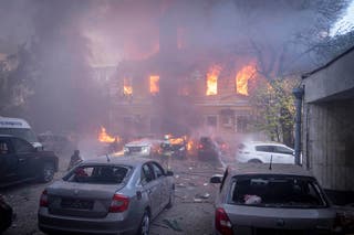 The National Academy of Sciences building burns after a Russian drone strike in the center of Kyiv, Ukraine, Monday
